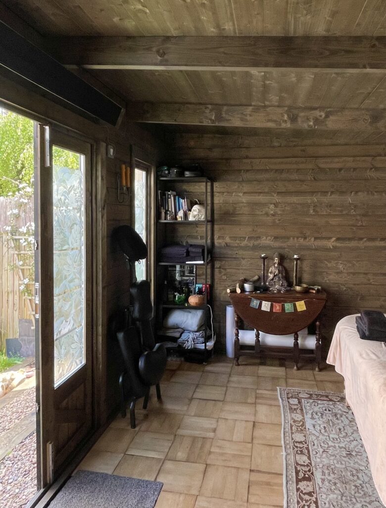 cabin parquet flooring wooden beams massage space